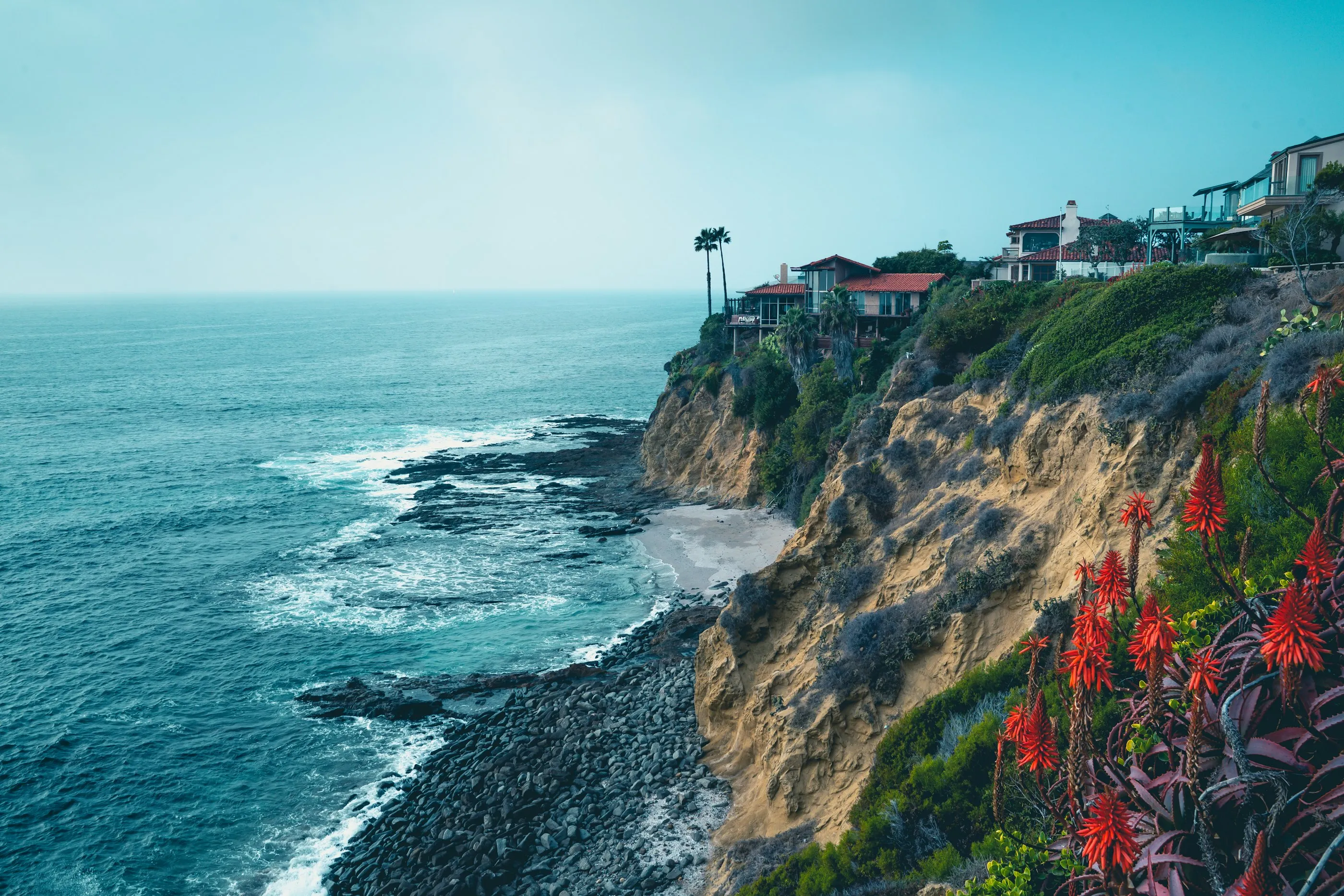 Homes on a cliff above the California coast